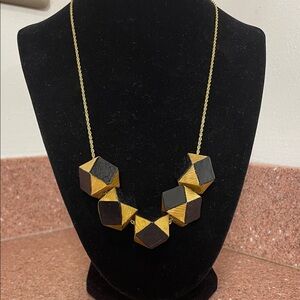 Elegant Gold and Black Geometric Necklace